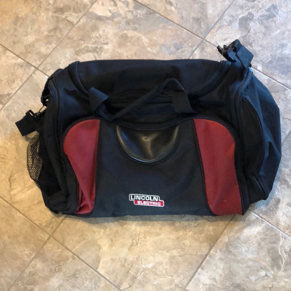 Red and black duffle bag